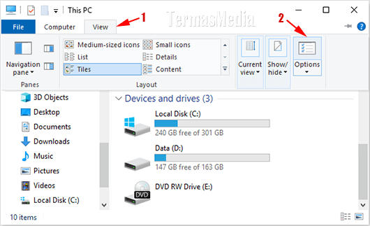 Cara menyembunyikan atau menampilkan drive letter di Windows