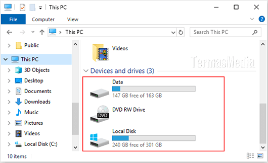 Cara menyembunyikan atau menampilkan drive letter di Windows