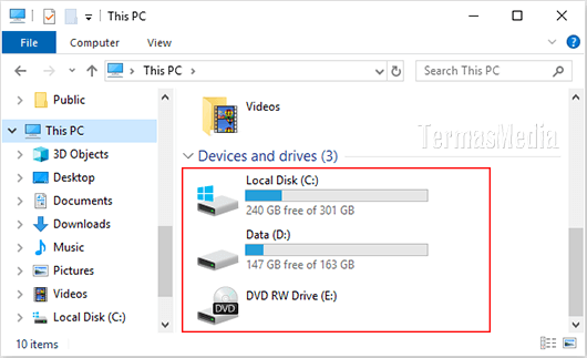Cara menyembunyikan atau menampilkan drive letter di Windows